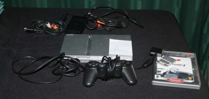 PlayStation 2 Slim with Remote, Game Cables and memory card
