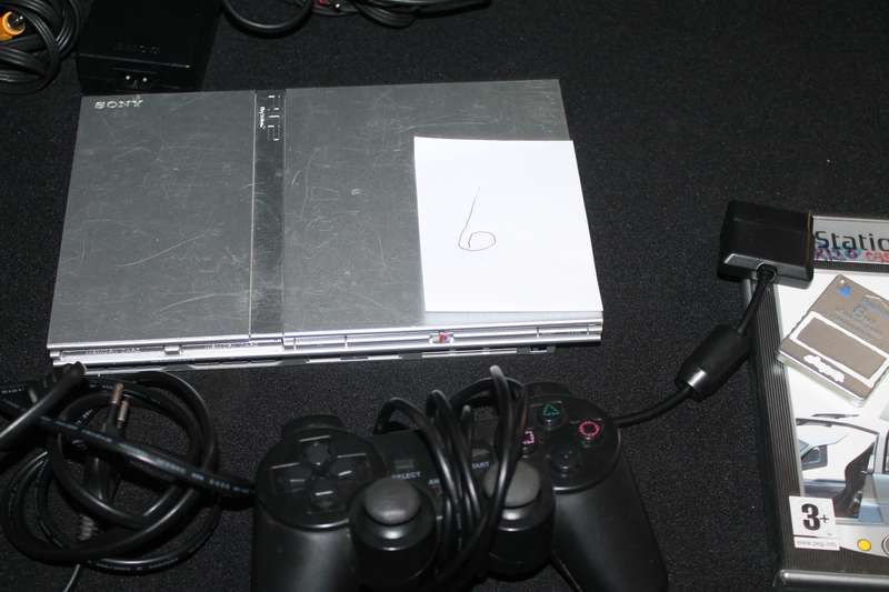 PlayStation 2 Slim with Remote, Game Cables and memory card