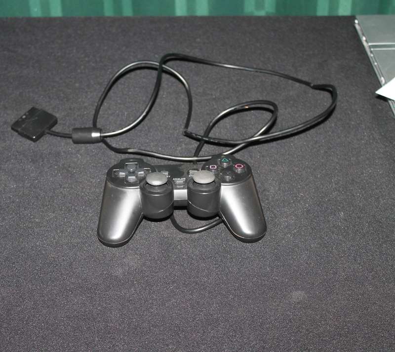 PlayStation 2 Slim with Remote, Game Cables and memory card