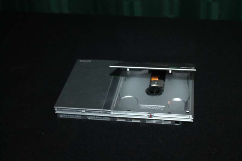 PlayStation 2 Slim with Remote, Game Cables and memory card