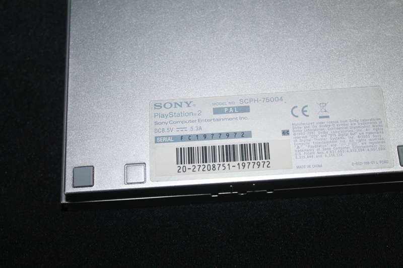 PlayStation 2 Slim with Remote, Game Cables and memory card