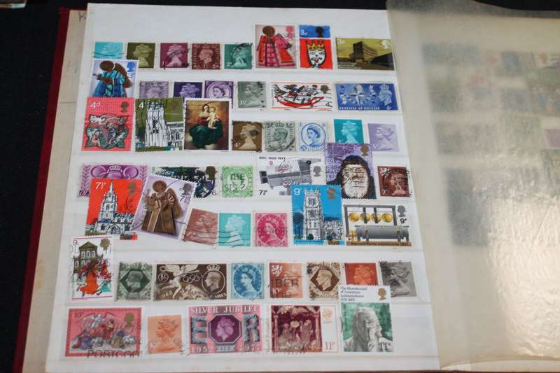 Album with Assorted Stamps Over 400 stamps