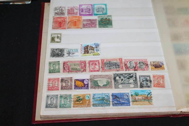 Album with Assorted Stamps Over 400 stamps