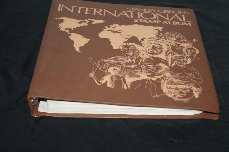 Stamp Album with 300 assorted stamps