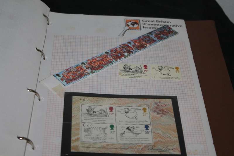 Stamp Album with 300 assorted stamps