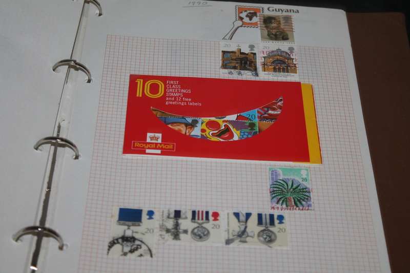 Stamp Album with 300 assorted stamps
