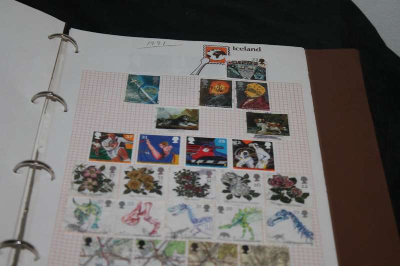 Stamp Album with 300 assorted stamps