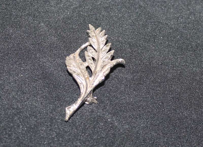 4 Marcasite Brooches and a pair of earrings