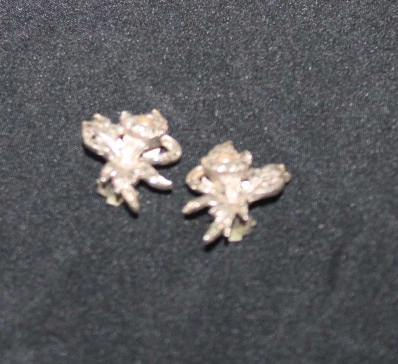 4 Marcasite Brooches and a pair of earrings