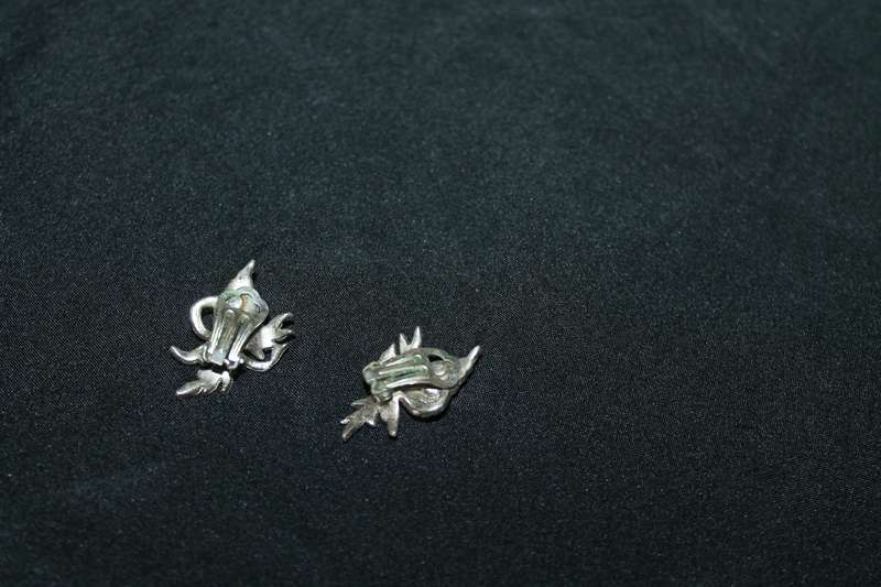 4 Marcasite Brooches and a pair of earrings
