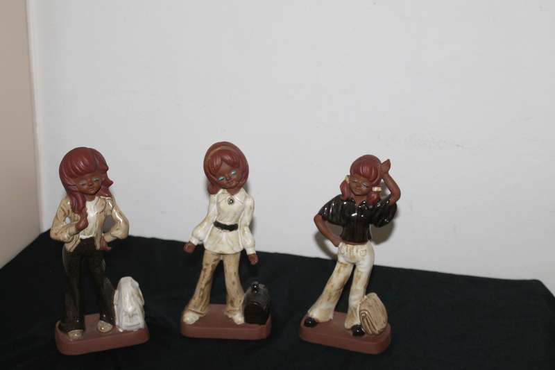 3 Lady figures