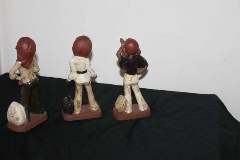 3 Lady figures