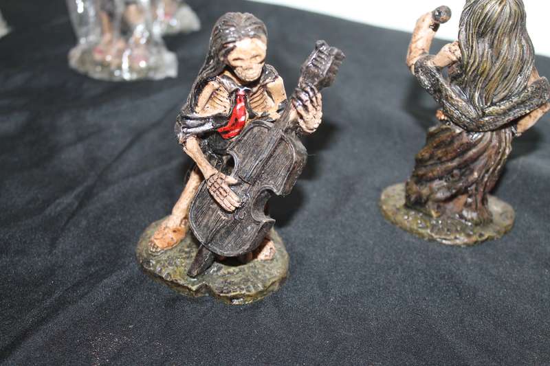 Set of 2 Rolling Bones Figures