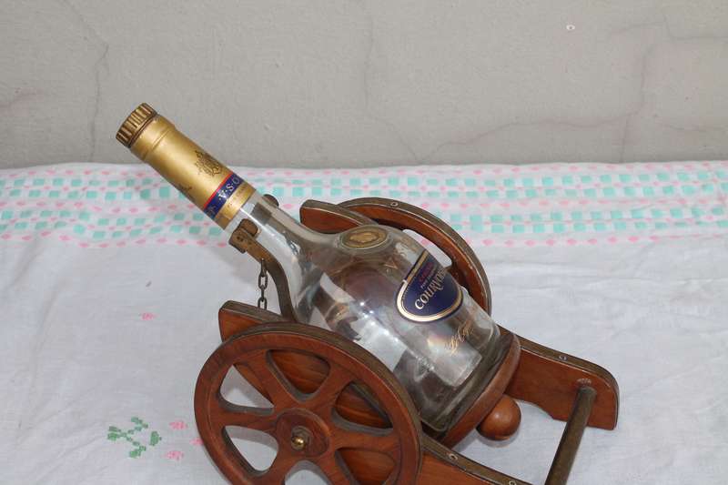 Wagon Holding Brandy bottle