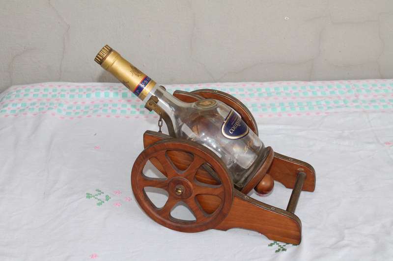 Wagon Holding Brandy bottle