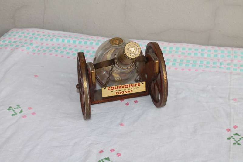 Wagon Holding Brandy bottle