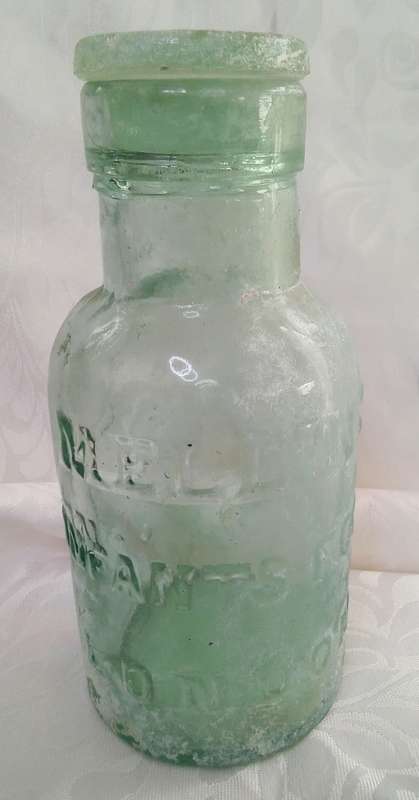 Lovely aqua Mellin's infant food London bottle with original glass lid c1910