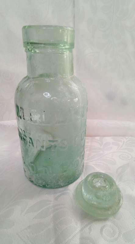 Lovely aqua Mellin's infant food London bottle with original glass lid c1910