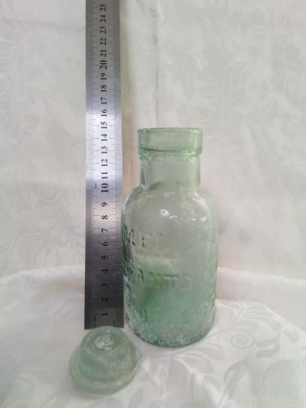 Lovely aqua Mellin's infant food London bottle with original glass lid c1910