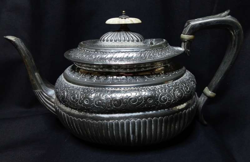 Magnificent antique tea pot with bone detail