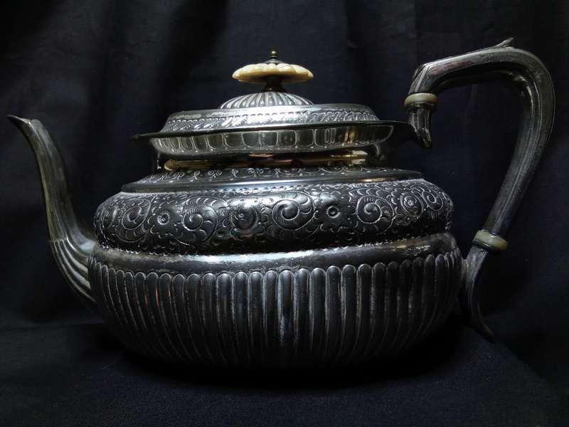 Magnificent antique tea pot with bone detail