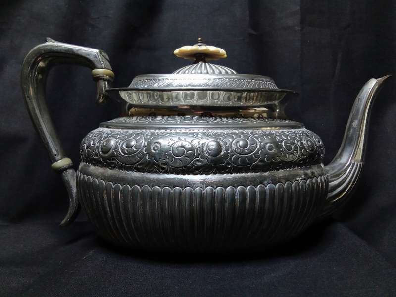 Magnificent antique tea pot with bone detail