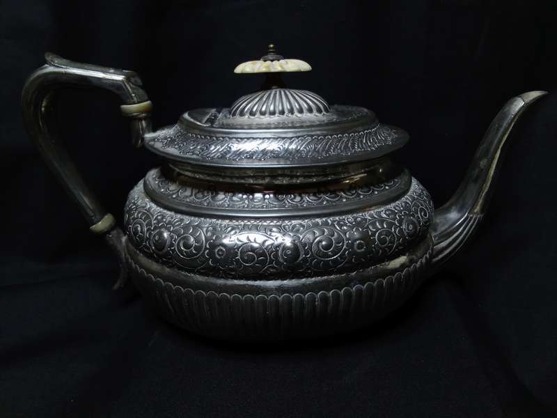 Magnificent antique tea pot with bone detail