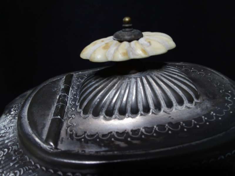 Magnificent antique tea pot with bone detail