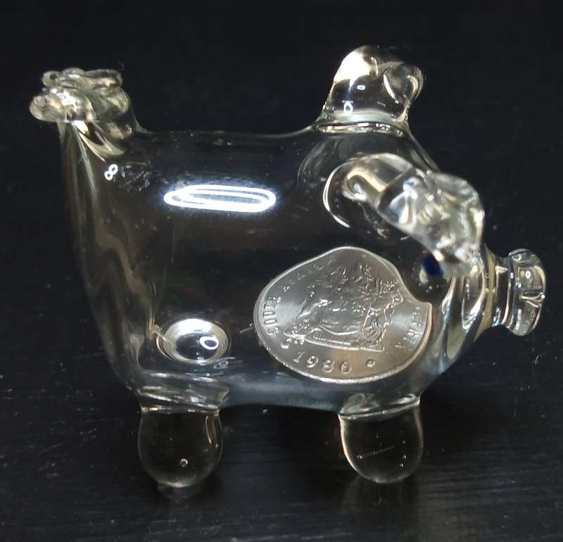 Cutest little vintage glass pig with an "old-fashioned" 10c coin inside