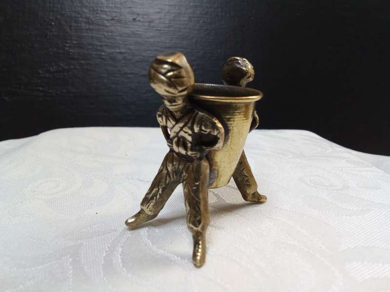 Lovely tiny brass figurine of two hardworking men
