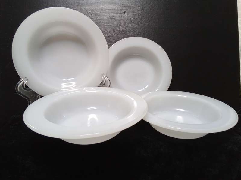 Four lovely white milk glass bowls