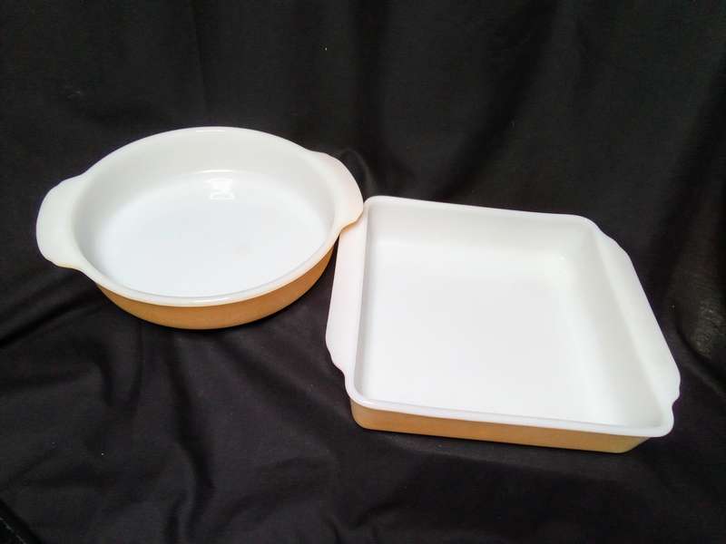Two charming Anchor Hocking Fire King peach luster casserole dishes