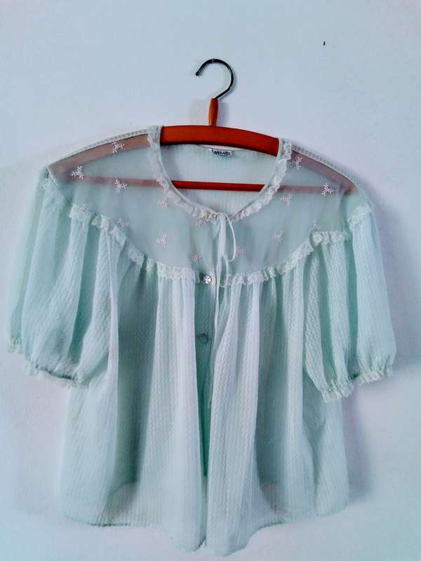 Two lovely vintage 1950`s pale blue bed jackets