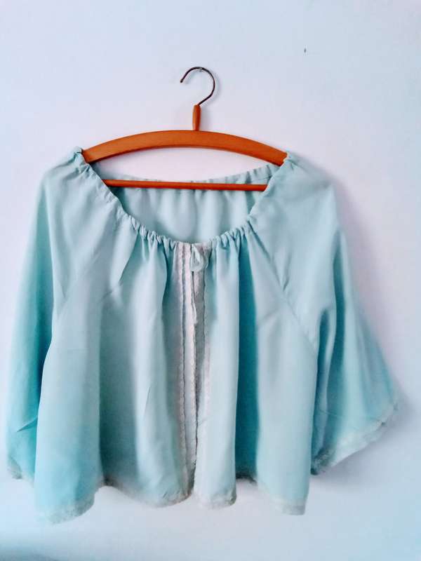 Two lovely vintage 1950`s pale blue bed jackets
