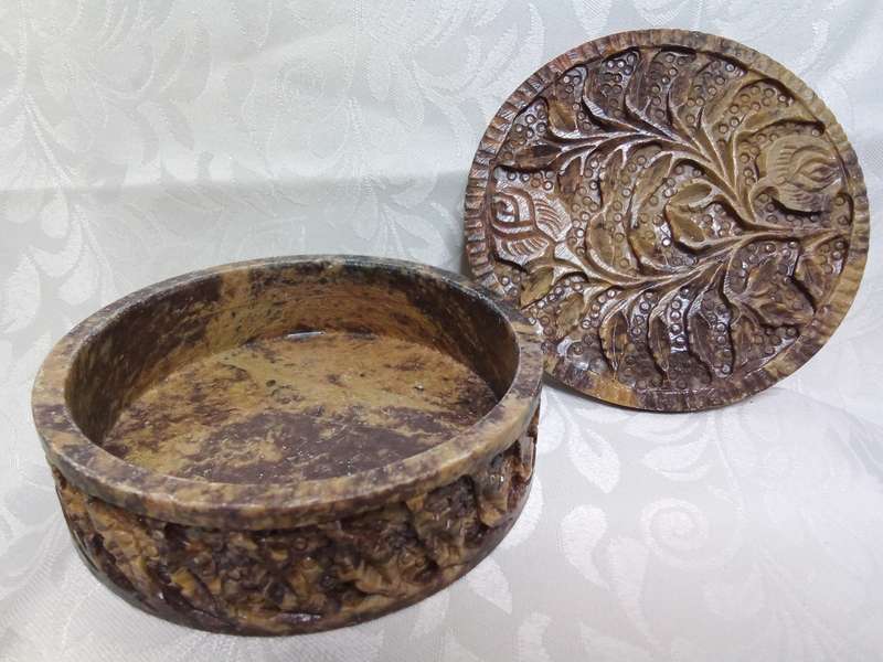 A lovely collection of vintage brown hand carved Soapstone trinket boxes