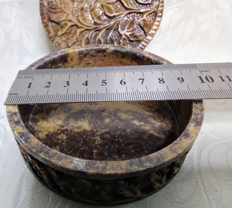 A lovely collection of vintage brown hand carved Soapstone trinket boxes