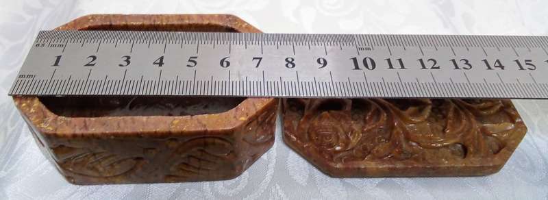 A lovely collection of vintage brown hand carved Soapstone trinket boxes