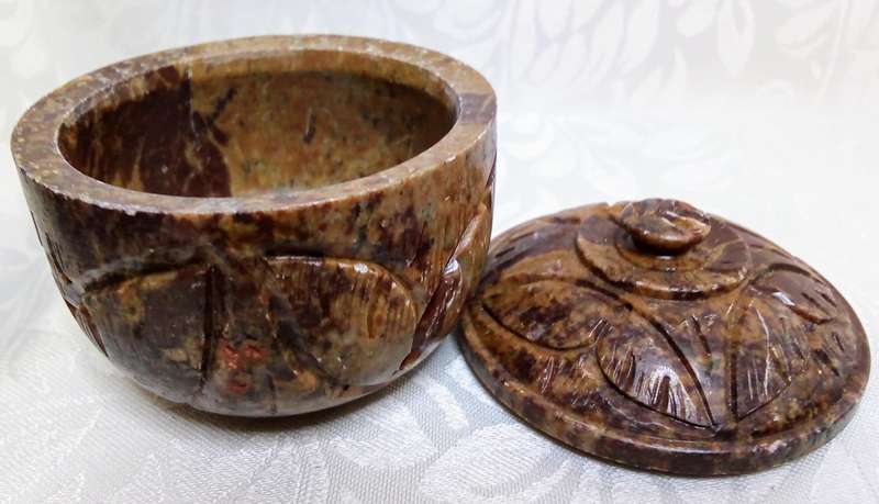 A lovely collection of vintage brown hand carved Soapstone trinket boxes