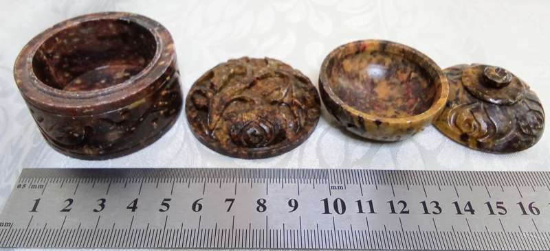 A lovely collection of vintage brown hand carved Soapstone trinket boxes