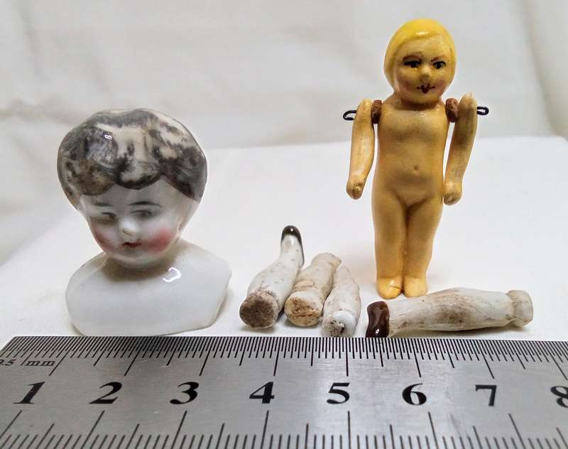 Two pretty vintage porcelain doll/pieces