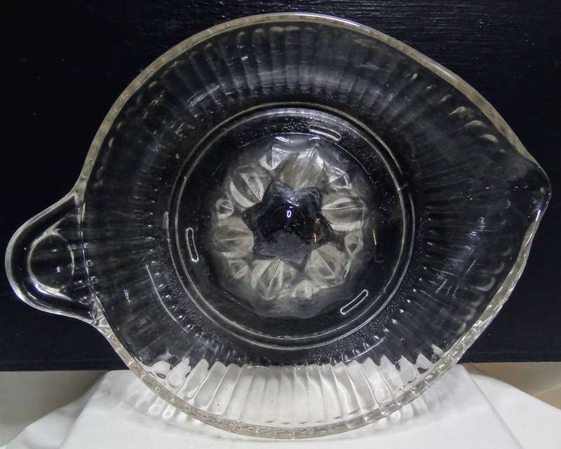 Vintage pressed glass citrus juicer
