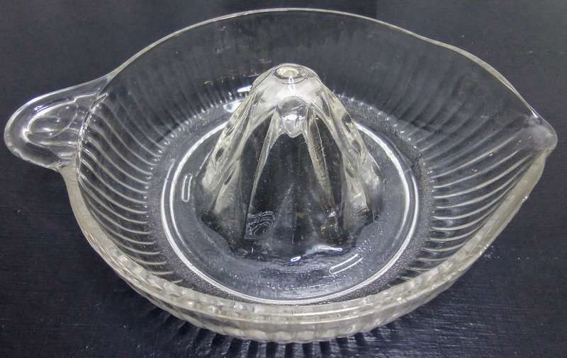 Vintage pressed glass citrus juicer