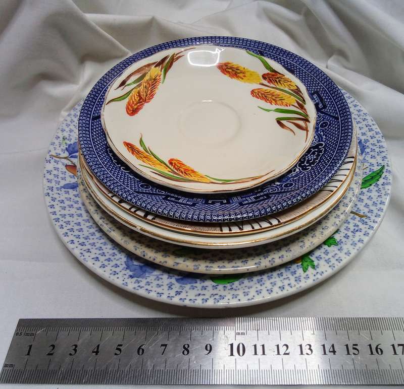 Stunning collection of vintage plates, side plate and smaller
