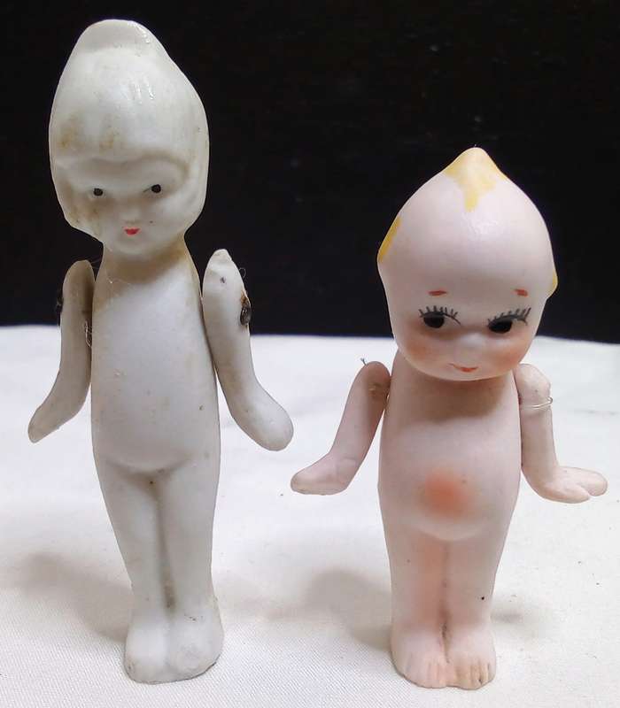 Two stunning vintage porcelain dolls in very good condition