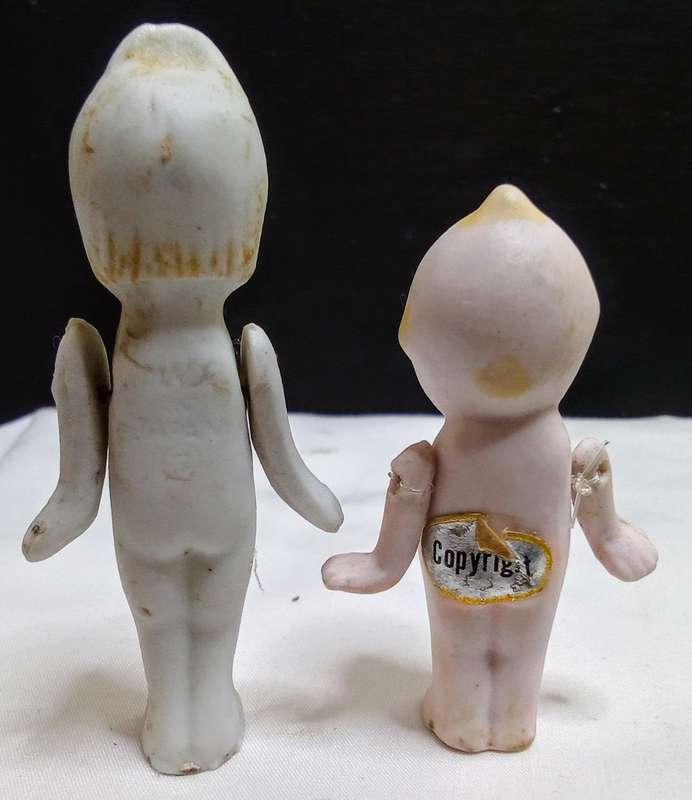 Two stunning vintage porcelain dolls in very good condition