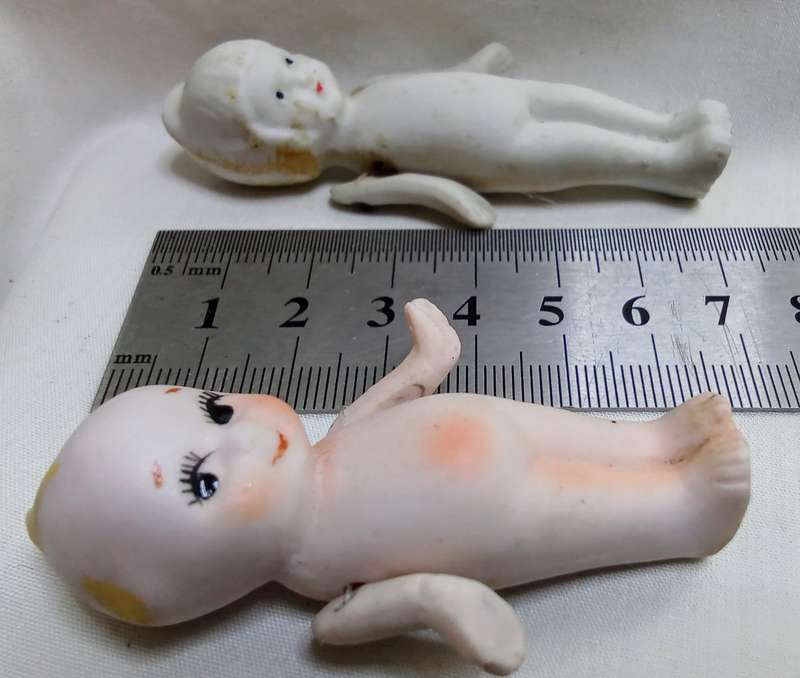 Two stunning vintage porcelain dolls in very good condition