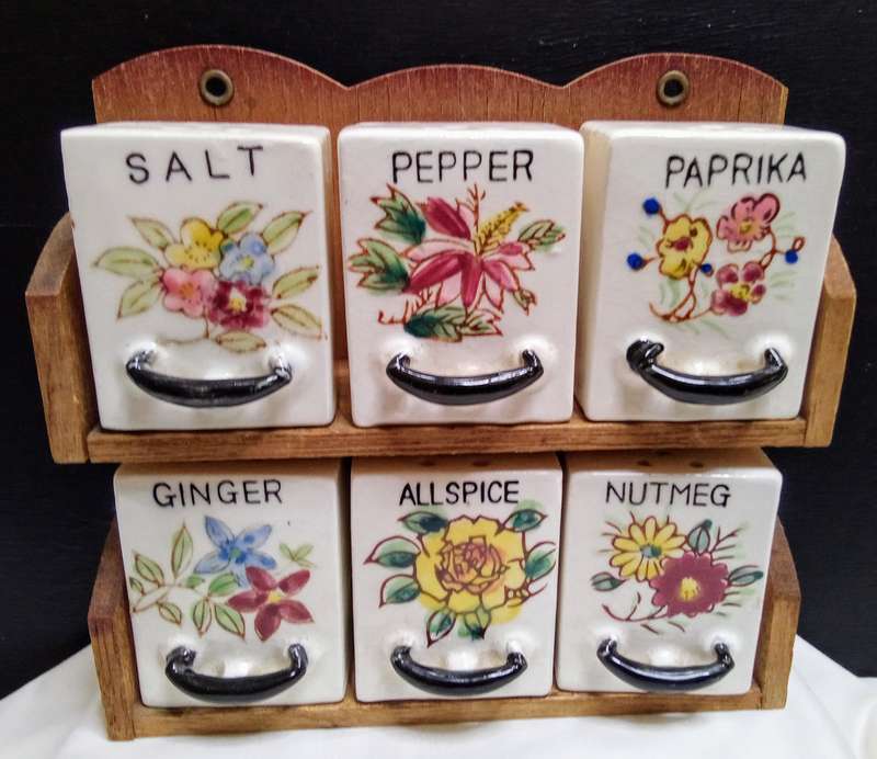 Lovely vintage spice rack with porcelain canisters