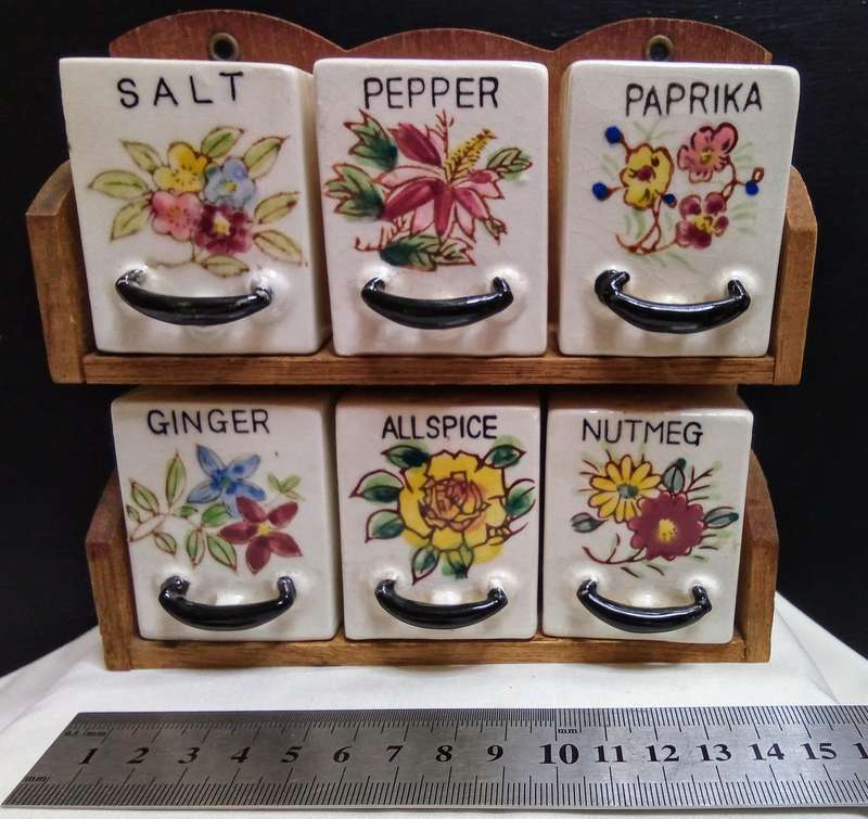 Lovely vintage spice rack with porcelain canisters