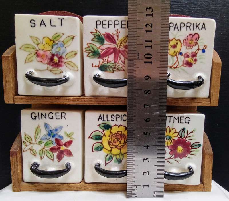 Lovely vintage spice rack with porcelain canisters