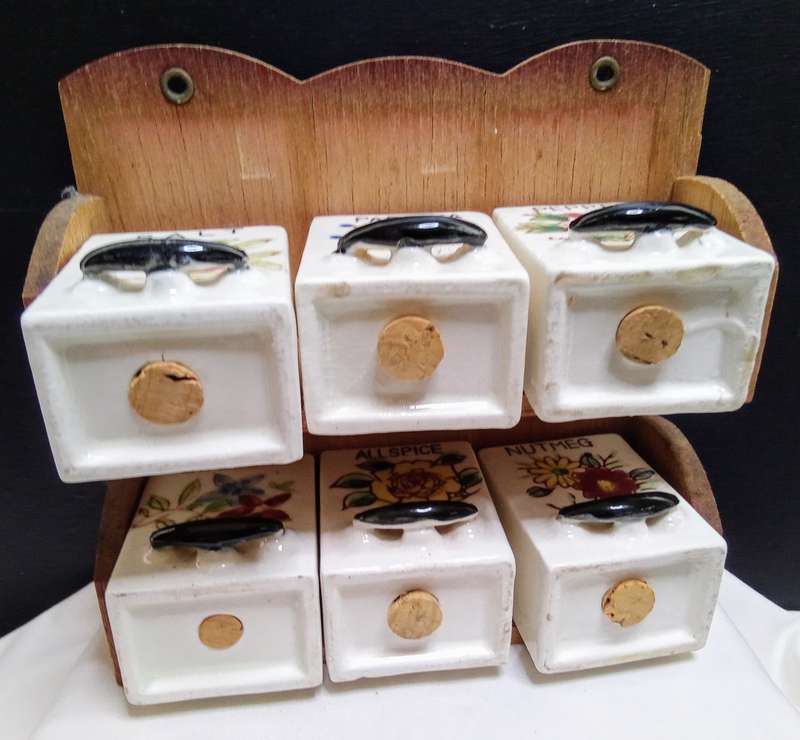 Lovely vintage spice rack with porcelain canisters